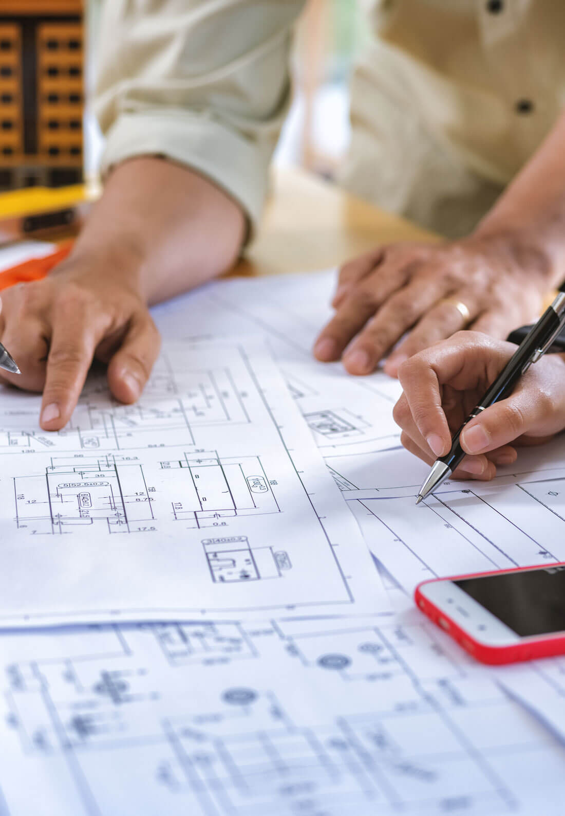Team Looking Over Blueprints